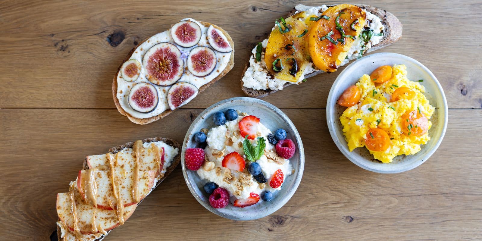 Ricotta cheese and cottage cheese on toasts, with fruits and in eggs.