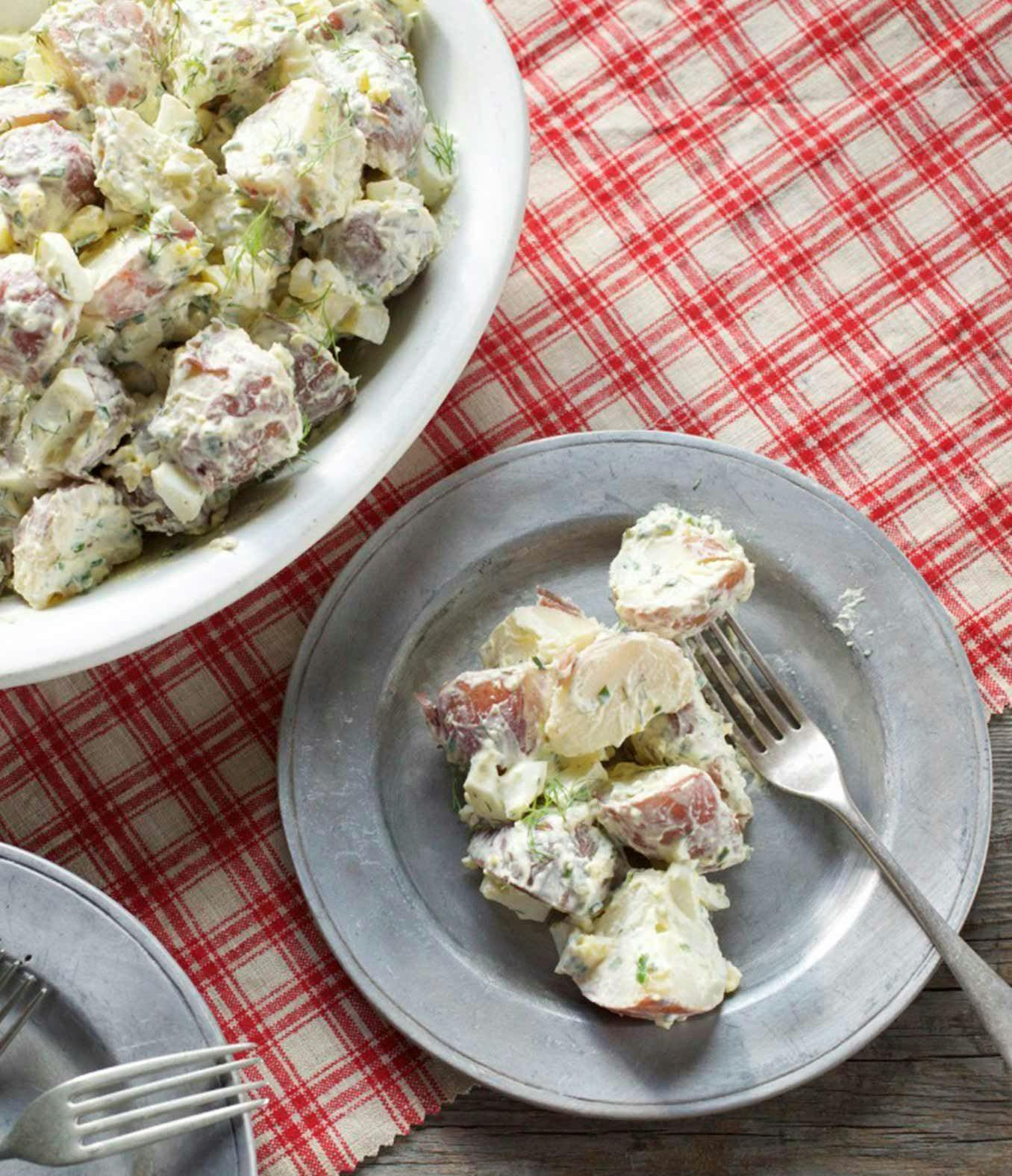 Picnic Potato Salad on a red and white checked picnic blanket.